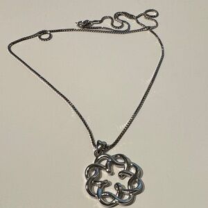 Elegant Silver Necklace with Intricate Pendant
